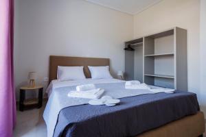 Postel nebo postele na pokoji v ubytování Villa Kotetsi