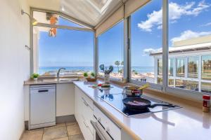 Η κουζίνα ή μικρή κουζίνα στο Ático Apartamento Las Burras Playa by VillaGranCanaria
