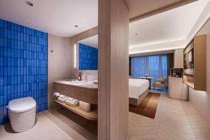 Bilik mandi di Orange Crystal Hotel MixC Shantou East Coast
