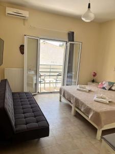 Ένα ή περισσότερα κρεβάτια σε δωμάτιο στο Agelina Apartment +5 φωτογραφίες