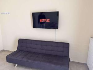 Μια τηλεόραση ή/και κέντρο ψυχαγωγίας στο Agelina Apartment