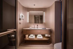 Bilik mandi di Orange Crystal Hotel MixC Shantou East Coast