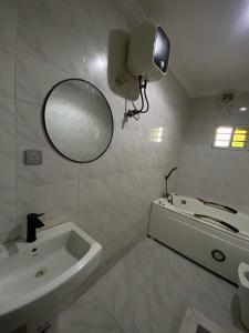 Koupelna v ubytování 165 Homes + 5 fotografií