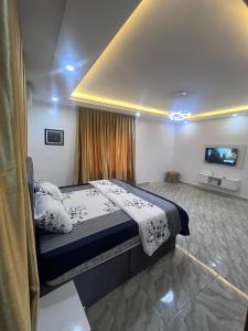 Postel nebo postele na pokoji v ubytování 165 Homes