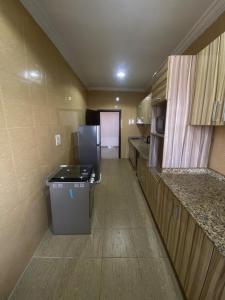 Kuchyň nebo kuchyňský kout v ubytování 165 Homes