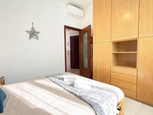 Giường trong phòng chung tại 250 mt dal mare - Alloggio Centrale con Aria Condizionata