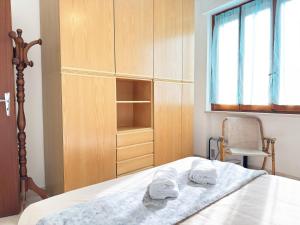 Giường trong phòng chung tại 250 mt dal mare - Alloggio Centrale con Aria Condizionata