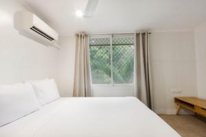 Postel nebo postele na pokoji v ubytování Citi Serviced Apartments - Gaba Place