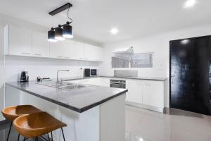 Kuchyň nebo kuchyňský kout v ubytování Citi Serviced Apartments - Gaba Place