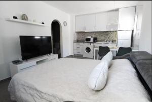 Kuchyň nebo kuchyňský kout v ubytování Casa Planta Alta Bungalow 29 + 4 fotografie