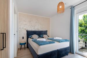 Postel nebo postele na pokoji v ubytování Odmoree Camp & Hostel