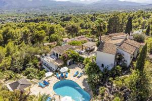 an aerial view of a house with a swimming pool at Caroix in Montgo