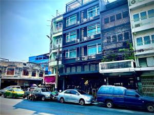a group of cars parked in front of a building at The Circle 4 in Bangkok