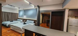 Letto o letti in una camera di Sunway Resort Suite Linked to Pyramid and Lagoon
