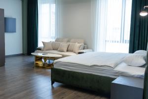 Letto o letti in una camera di Fidji Hotel