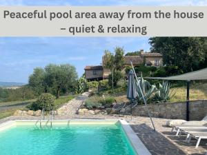 a backyard pool area away from the house quiet relaxing at Villa Solisera in Todi +30 photos