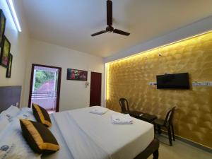 TV a/nebo společenská místnost v ubytování DK Resortss