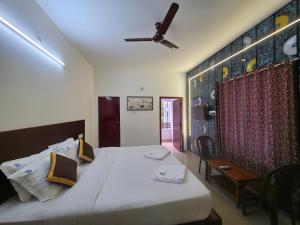 Postel nebo postele na pokoji v ubytování DK Resortss + 26 fotografií