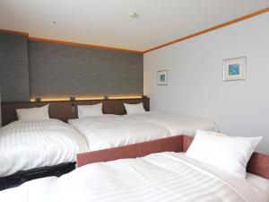 Letto o letti in una camera di Hotel Castle Inn Ise