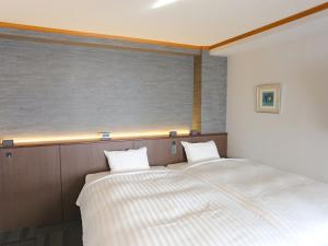 Letto o letti in una camera di Hotel Castle Inn Ise