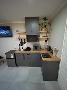 Kuchyň nebo kuchyňský kout v ubytování Perfect Stay Kimberley 2