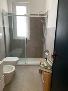 Koupelna v ubytování La Casa dei palmizi + 23 fotografií