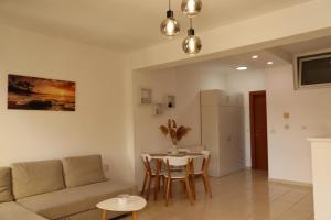 Χώρος καθιστικού στο Apartman KORMILO