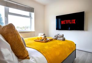 Long LawfordにあるDen Duplexのベッドルーム1室(壁にテレビ付) +22枚の写真