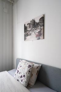 Postel nebo postele na pokoji v ubytování Cozy Studio Apt in Kamppi with Perfect Location