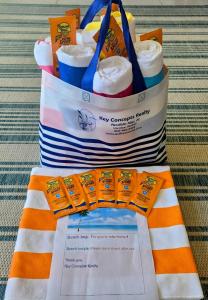 a bag of may cupcake party items on a table at Grand Caribbean 214W in Pensacola