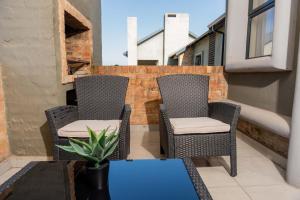 Posezení v ubytování Palm Nest