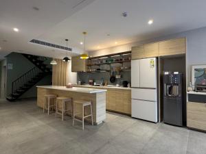 Kuchyň nebo kuchyňský kout v ubytování Yoshi Hotel - Tainan Sinmei Branch