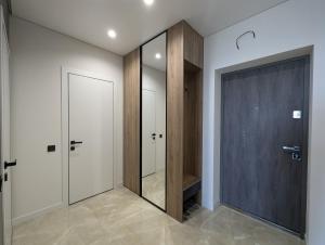 Gambar di galeri bagi Дизайнерські апартаменти Стрийська di Lviv