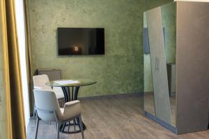 TV o dispositivi per l'intrattenimento presso Fidji Hotel