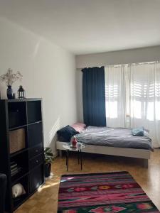 A cute room with 1,5 bed in shared flat 객실 침대