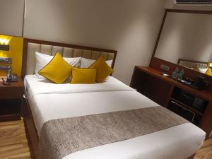 Postel nebo postele na pokoji v ubytování Hotel Flexi Residency Mumbai