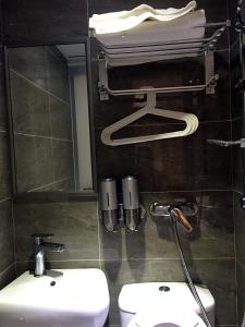 Ένα μπάνιο στο 香港金門賓館 KamMun Guest House