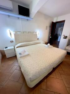 Postel nebo postele na pokoji v ubytování B&B Chorisia