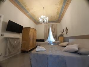 Postel nebo postele na pokoji v ubytování Il Sogno Torino Guesthouse