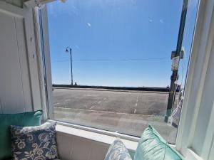 a window with a view of an empty street at Trispin at Sophias in Penzance