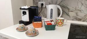 Příslušenství pro přípravu čaje a kávy v ubytování Onda Marina 2