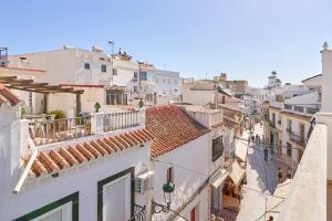 an aerial view of a city with buildings at Apartamento B y G Nerja in Nerja