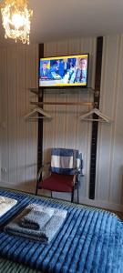 A television and/or entertainment centre at Casa Raposeira