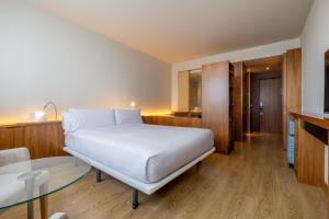 Postel nebo postele na pokoji v ubytování Hotel SB Diagonal Zero 4 Sup