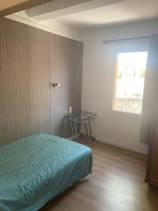 Кровать или кровати в номере Grande maison de ville T7