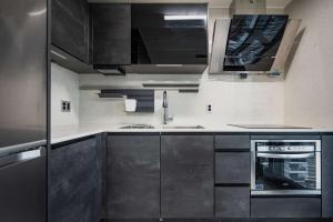 Kuchyň nebo kuchyňský kout v ubytování Odays Osiria Residence