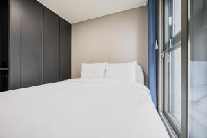 Postel nebo postele na pokoji v ubytování Odays Osiria Residence