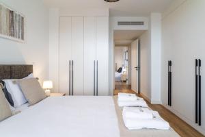 Ένα ή περισσότερα κρεβάτια σε δωμάτιο στο GuestReady - The perfect view in Funchal
