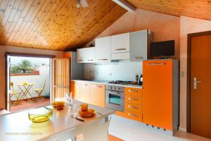 Kuchyň nebo kuchyňský kout v ubytování Moresco Apartment