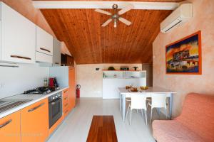 Kuchyň nebo kuchyňský kout v ubytování Moresco Apartment